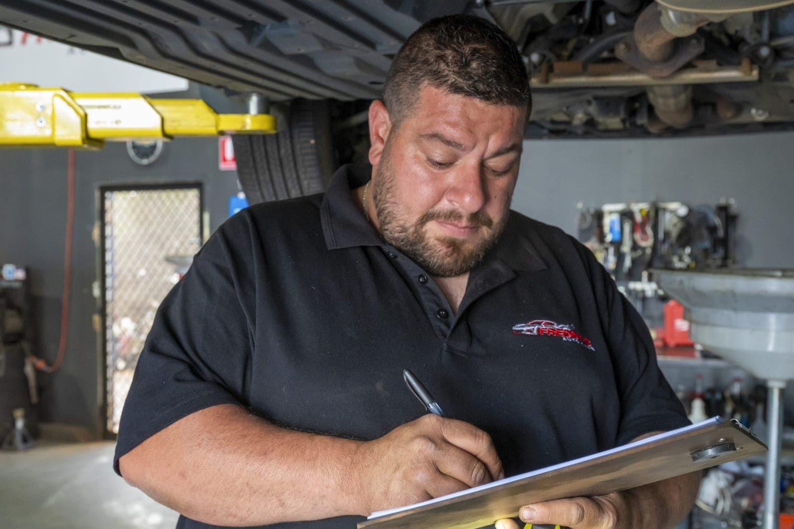 Licensed Vehicle Tester at Freddy's Auto Care recording a roadworthy inspection in Craigieburn